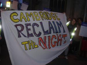 Large banner with the words 'Cambridge Reclaim the Night'